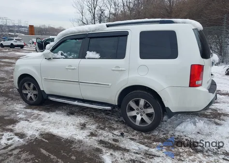 2014 Honda Pilot Touring z USA, uszkodzony, nr VIN 5FNYF4H95EB003173